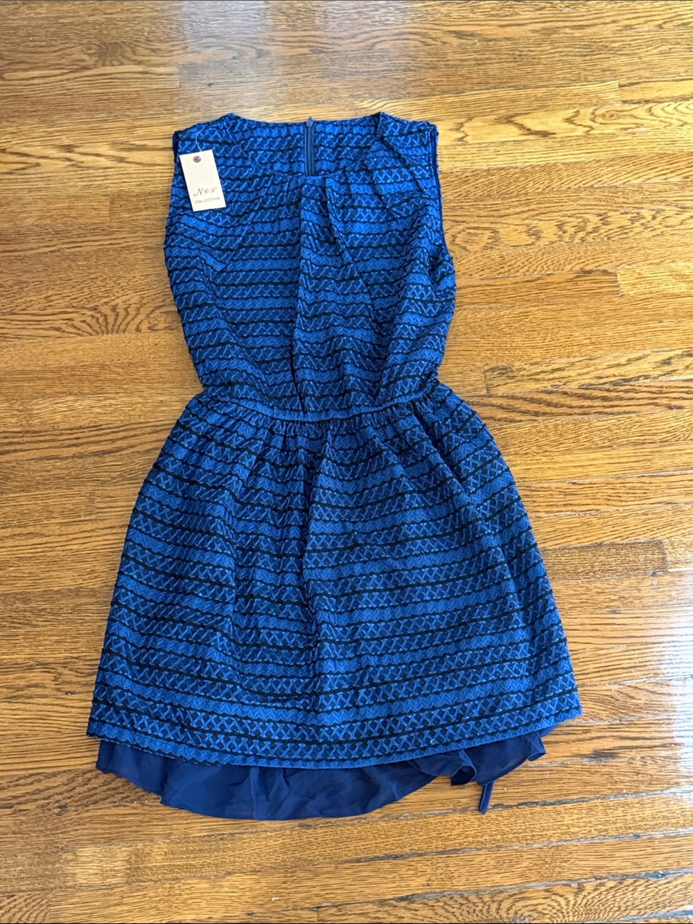 New with tags navy blue summer dress. Can fit xs or small.
